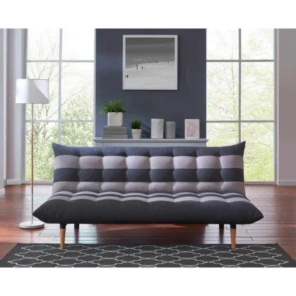 Sofá cama Wing clic-clac gris en ambiente moderno y luminoso