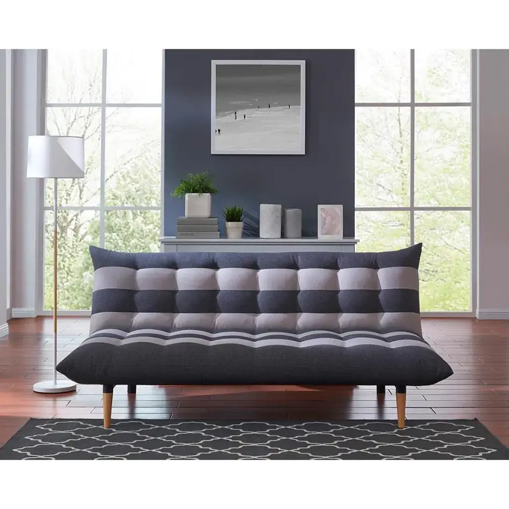 Sofá cama Wing clic-clac gris en ambiente moderno y luminoso