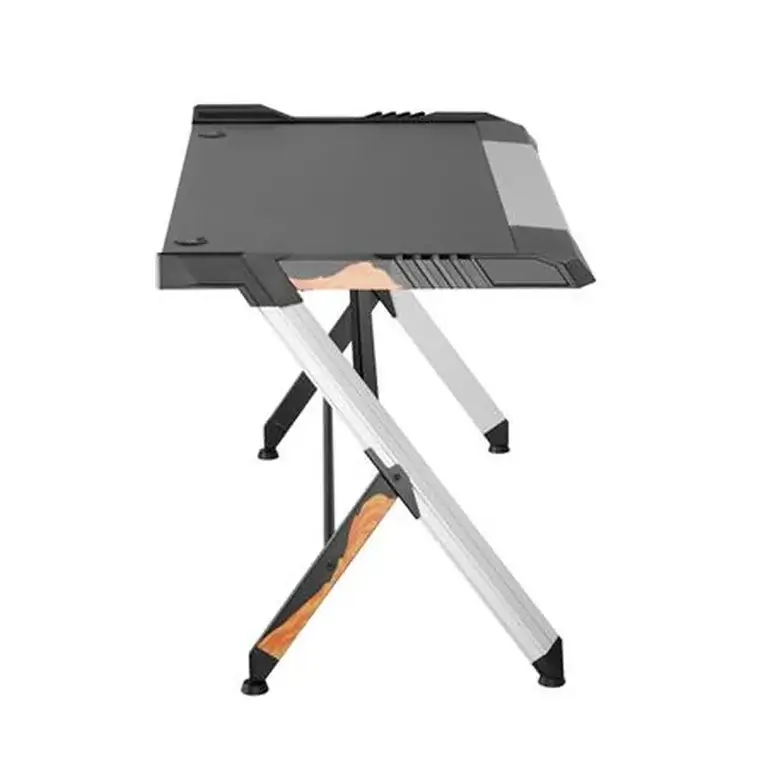 Escritorio gamer Volten TB400 vista lateral con patas metálicas y refuerzo inferior, mesa gaming con LED