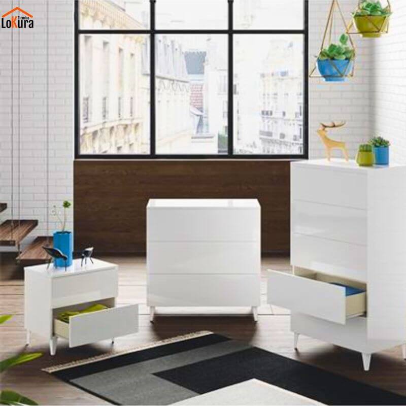 Conjunto de dormitorio moderno con mesita de noche blanca, cómoda y sinfonier, ideal para pisos luminosos en Canarias
