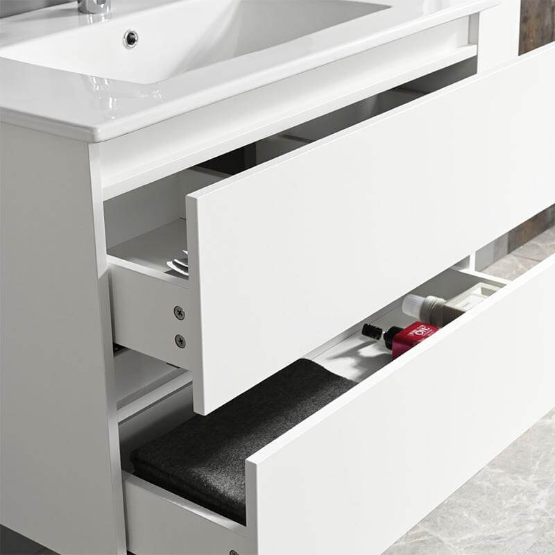 Mueble lavabo blanco suspendido con cajones amplios y diseño minimalista sin elementos metálicos