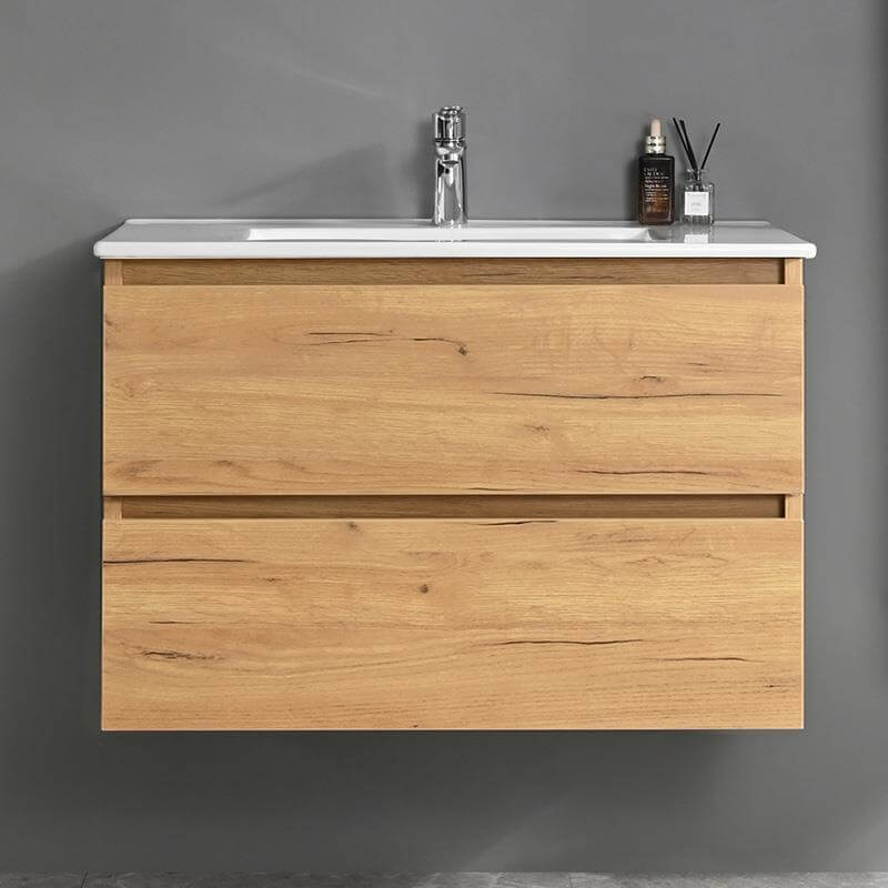 Mueble baño suspendido en color roble con poza rectangular en el lavabo cerámico.