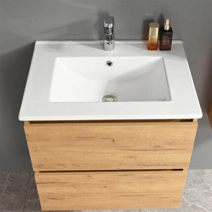 Lavamanos con gabinete Lavabo cerámico incluido en el mueble de baño Serie Sofía, diseño limpio y elegante.