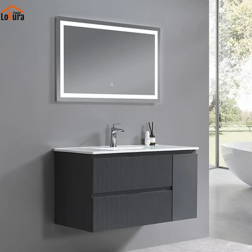 Mueble lavabo con espejo y luz color gris suspendido con dos cajones en baño moderno en Canarias