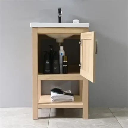 mueble baño Fénix 52cm pino interior con puerta abierta y espacio de almacenaje