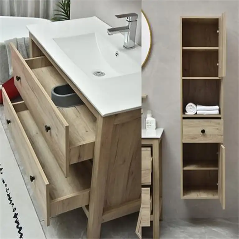 Detalle de almacenaje: interior de cajones y distribución de la columna colgada del conjunto de baño color roble Serie Lirio