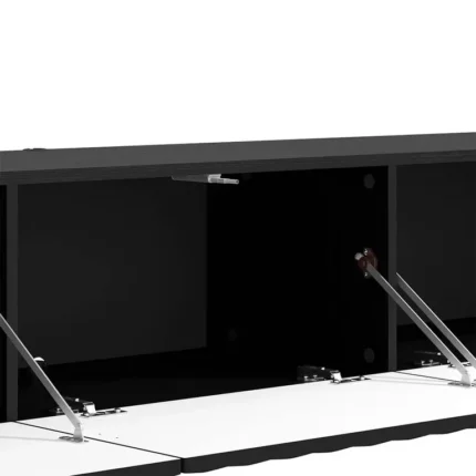 Interior del mueble TV Antibes negro con puertas abatibles y bisagras metálicas