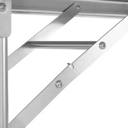 Detalle del refuerzo articulado de la mesa de trabajo plegable