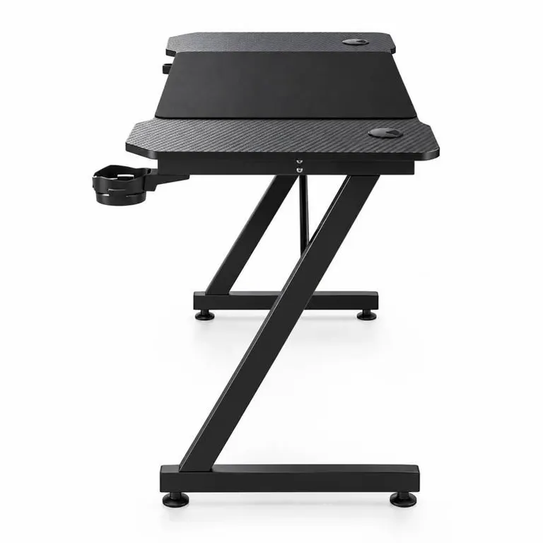 Perfil lateral de la TB600 y su base de patas inclinadas